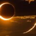 Solar Eclipse with Light Halo and Black Space Background